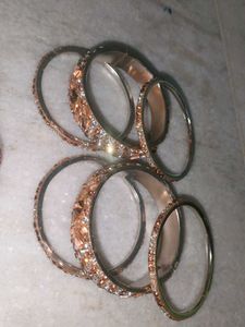 2 Sets Of Two Shiny Bangles