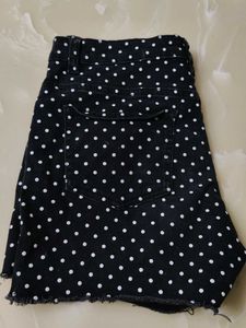 A beautiful black hipster shorts with polka dots.