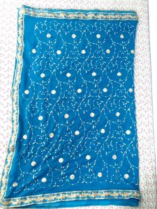 ✨ Teal Blue Saree with Golden Floral Elegance ✨