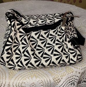 2 unique white black handbags