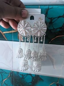 three long Elegant Silver Jhumka Earrings