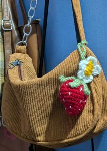 Crochet strawberry and flower charm