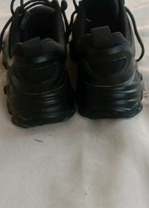 black chunky sole shoe