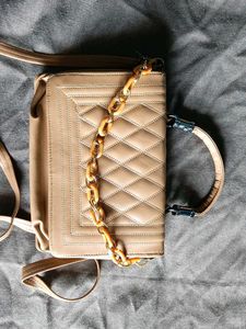 A Nude Sling Bag