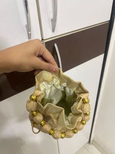 Elegant Gold Embroidered Potli Bag