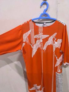 Oraange Boat Neck Kurti.