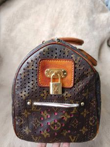 Louis Vuitton Perforated Fuschia Speedy 30