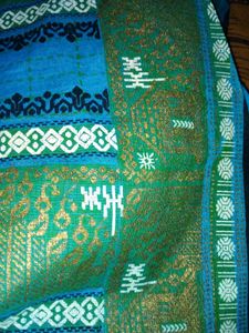 Womens Blue Cotton Saree With Golden Bady.