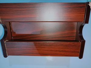 A wooden makeup or pen stand