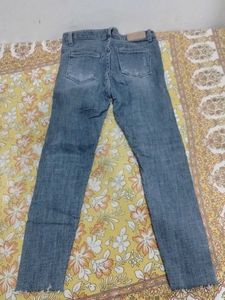 Distressed Denim Jeans