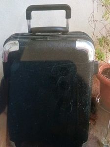 Black suitcase for tourism