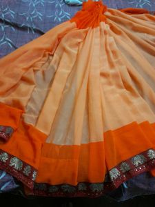 Classicate Orange Embroidered Chiffon Saree