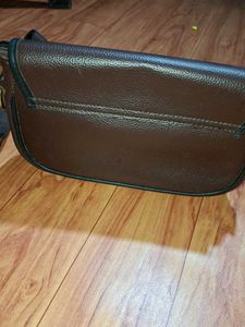 brown sling bag