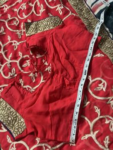 Dark peach embroidered saree