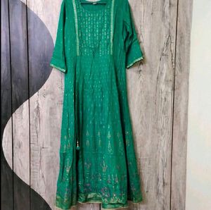 Green ethnic dress with tassels