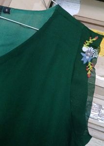 Short Green Top With Embroidery .