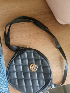 Quilted Circle Sling Bag