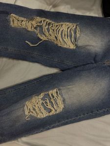 Blue ripped baggy jeans