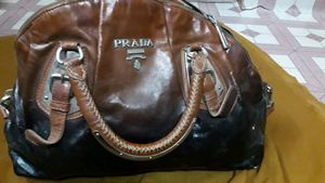 Authentic Prada Handbag With Some Scuff & Crack