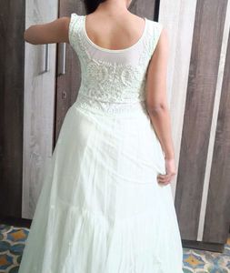 A Mint Green Floral Gown .