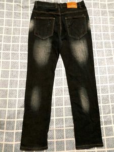 Distressed Denim Jeans