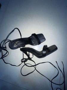 Black High Heels With Laces Or Strips