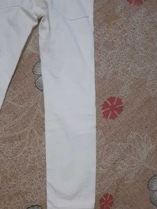 Distressed White Denim Jeans