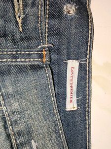 Distressed Denim Jeans