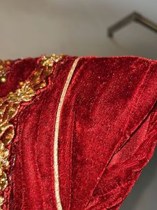 Long maroon Velvet gown With beads Work