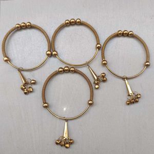 GOLDEN METAL LATKAN BANGLES WITH GHUNGROO