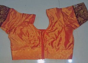 Orange  and maroon Embroidered Saree