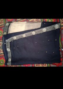 pretty olive black saree.