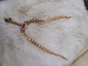 Gold Tone Hand Chain with Ruby