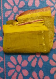 Yellow Saree With Golden Design