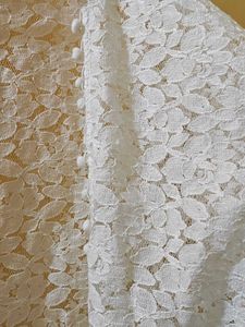 White Lace Shrug with Pom Poms