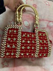Elegant Red & Gold Embellished Bag