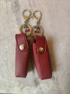 Tira Coach Cherry Lipstick Holder
