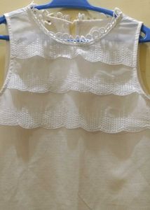 White Sleeveless Top