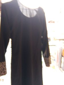 Black Skirt with Embroidered Hem