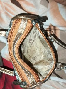 Unique Bronze-tone Handbag