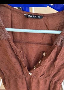 Combo of brown dress and black wide leg jeans