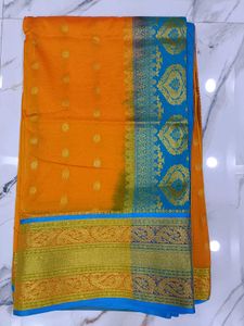 Orange and sky blue combination saree