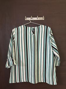 A Multi-coloured striped top.