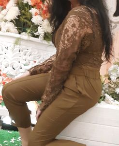Step Sleeve Jumpsuit With Crochet Jacket.