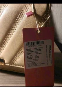 Lino Perros Beige Quilted Handbag
