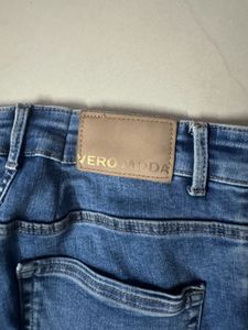 Ripped Knee Denim Jeans