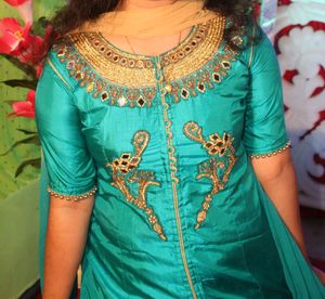 Women Embroidered Straight Kurta & Choli