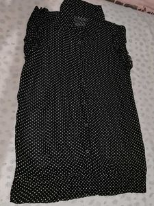 A Black Shirt With White Polka Dot