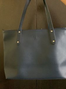 An Affordable Luxury Brand Pre Loved Tote Bag