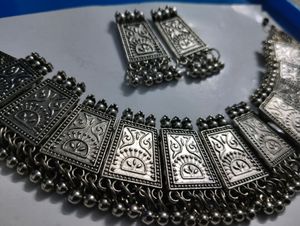 Combo Of One Black Metal Necklace With Earings And A Set Of Silver Bangles